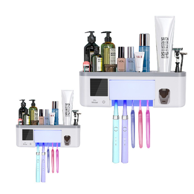 Carga por USB multifuncional del estante del almacenamiento del cepillo de dientes del ABS del desinfectante del tenedor del dispensador ultravioleta de la crema dental