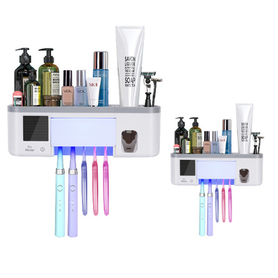 Exprimidor automático de la crema dental del cepillo de dientes del cuarto de baño ULTRAVIOLETA montado en la pared del tenedor
